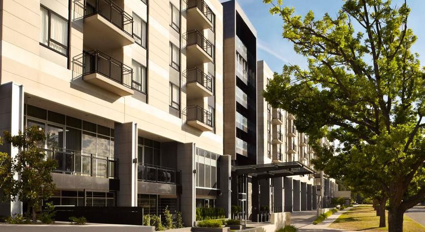 ホテル レルム キャンベラ エクステリア 写真 Residential complex in the city